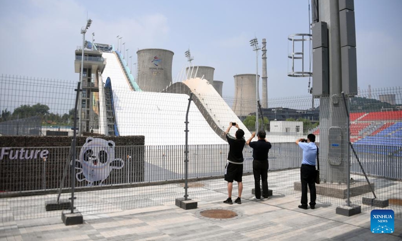 Journalists visit the Big Air Shougang in Shougang Park in Beijing, capital of China, Aug. 1, 2022. The 2022 China International Fair for Trade in Services (CIFTIS) will be held in Shougang Park and the China National Convention Center in Beijing from Aug. 31 to Sept. 5.(Photo: Xinhua)