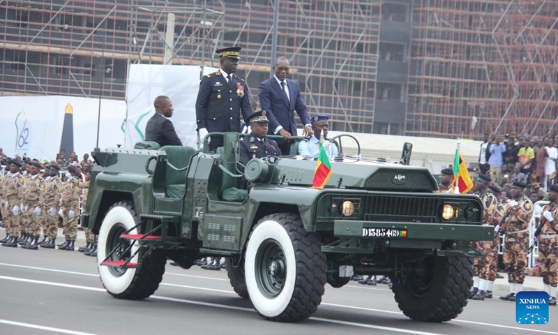 Beninese President Patrice Talon (C-R) reviews the armed forces during celebrations marking the 62nd anniversary of Benin's independence in Cotonou, Benin, on Aug. 1, 2022.(Photo: Xinhua)