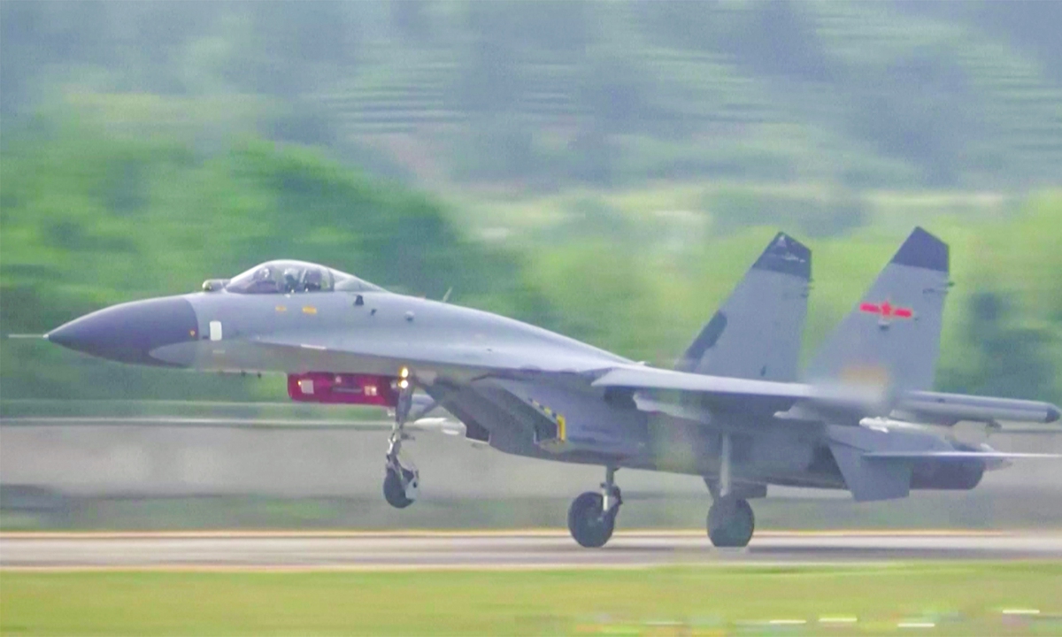 A J-11 fighter jet takes off from an undisclosed airfield on August 3, 2022. The Chinese People's Liberation Army Eastern Theater Command conducted realistic combat-oriented joint exercises in the sea and air space around the island of Taiwan on the day. Photo: VCG