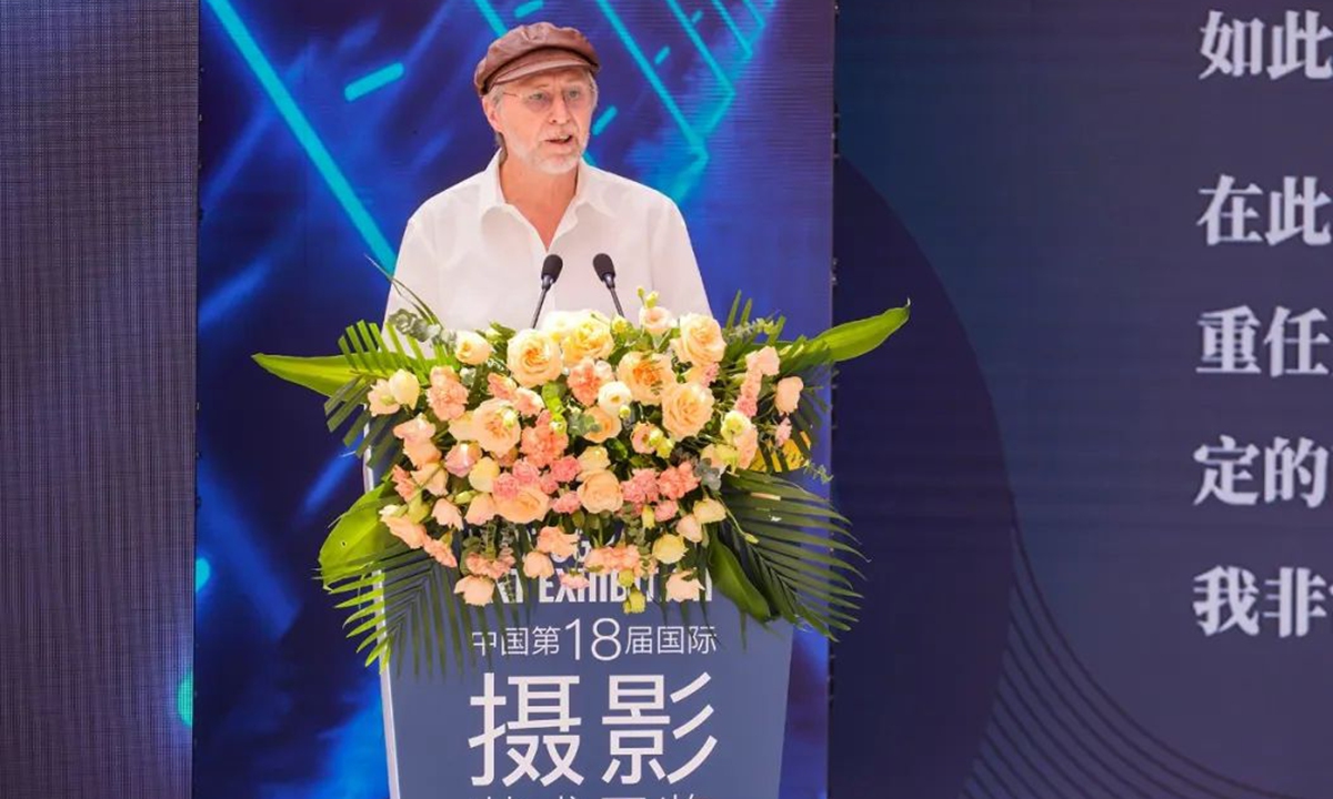Johann van der Walt, former president of the Photographic Society of South Africa, at teh opening ceremony of the 18th China International Photographic Art Exhibition (CIPAE), which is kicked off in Wuxi, East China's Jiangsu Province, on August 3, 2022. Photo: Courtesy of Chen Liming