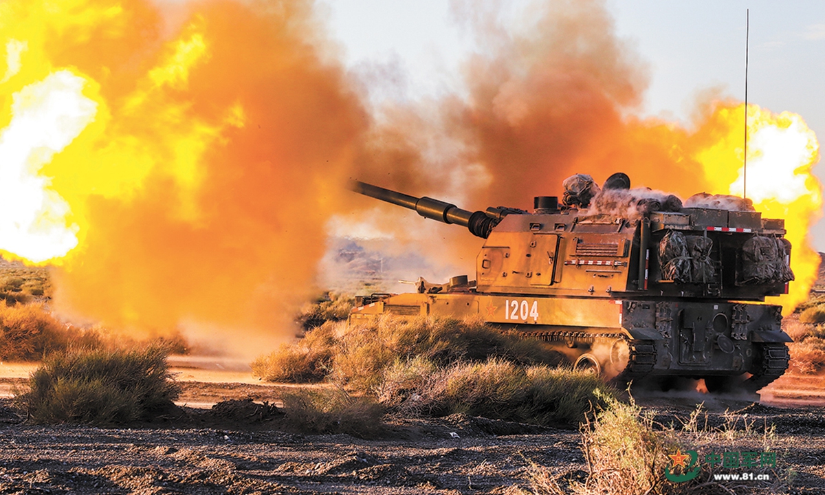 A self-propelled howitzer attached to an artillery detachment with a brigade under the PLA 81st Group Army fires at a mock target during a day-and-night live-fire training exercise at a training range on July 11, 2022. (eng.chinamil.com.cn/Photo by Wu Chao, Liu Qiang and Liang Tianchi)
