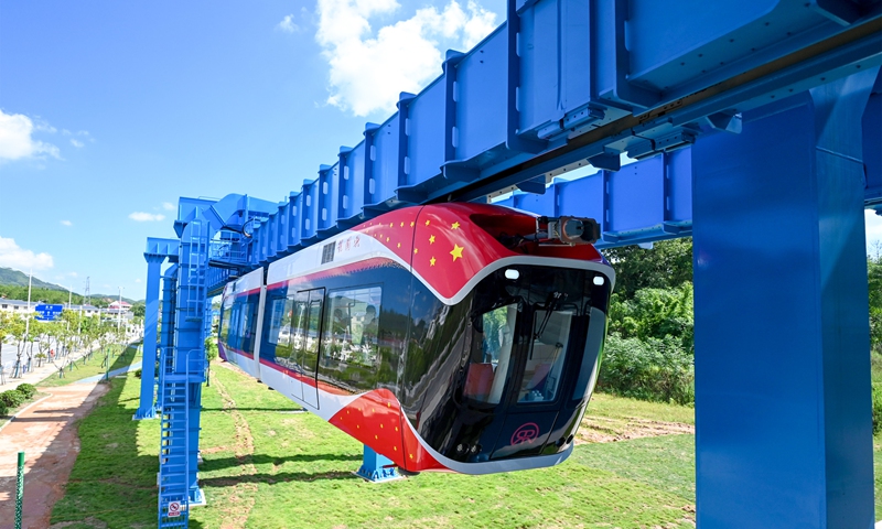 A maglev train Xingguo using the first permanent magnet maglev technology rolls off the production line in Wuhan, Central China's Hubei Province on December 14, 2021. The demonstration train features energy-saving functions, non-contact traction and strong climbing ability. The maximum speed is 120 kilometers per hour. Photo: VCG
