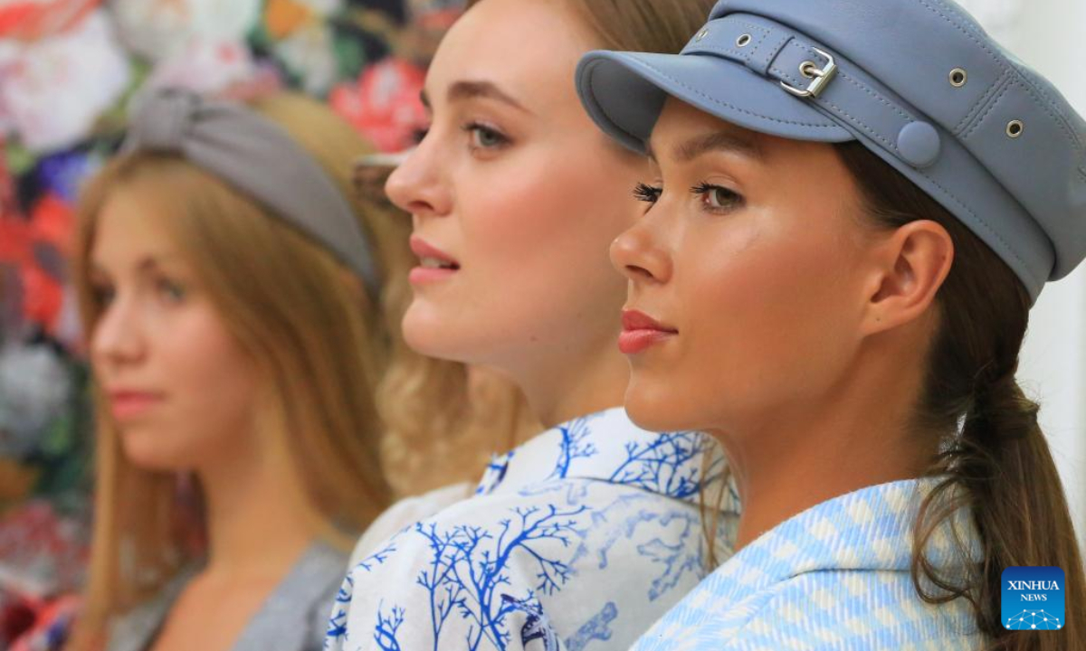Models present creations during a fashion fair in Minsk, Belarus, Aug 11, 2022. Photo:Xinhua