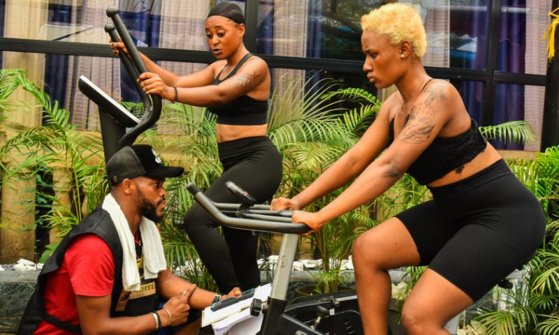 File photo taken on May 25, 2022 shows Jackson Stephanor (1st L), director of Boss Daughters, giving instructions to actresses while shooting the film in the Southwest region, Cameroon. Photo: Xinhua