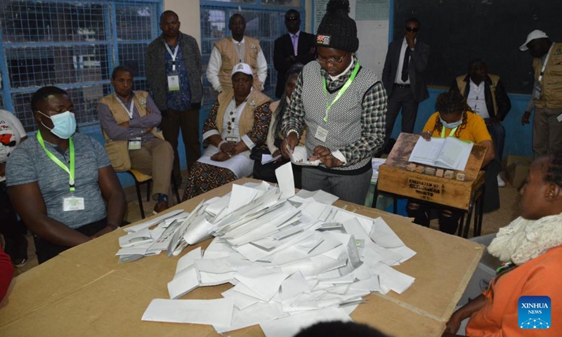An official of Kenya's Independent Electoral and Boundaries Commission counts ballots at a polling station in Nairobi Aug. 9, 2022. Kenya on Tuesday held general elections for the country's fifth president, members of the National Assembly, senators, and county governors.(Photo: Xinhua)