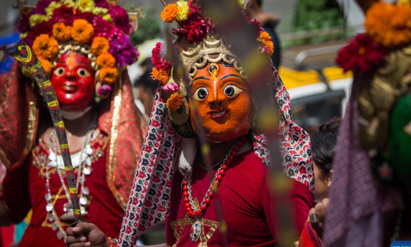 People take part in a parade during the Khadga Jatra festival in Kathmandu, Nepal, Aug. 14, 2022. Photo: Xinhua