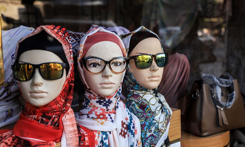 Photo shows mannequins wearing colorful Hijab in Gaza city on the first day after the end of the Gaza-Israel conflict, Aug. 8, 2022. (Photo: Xinhua)