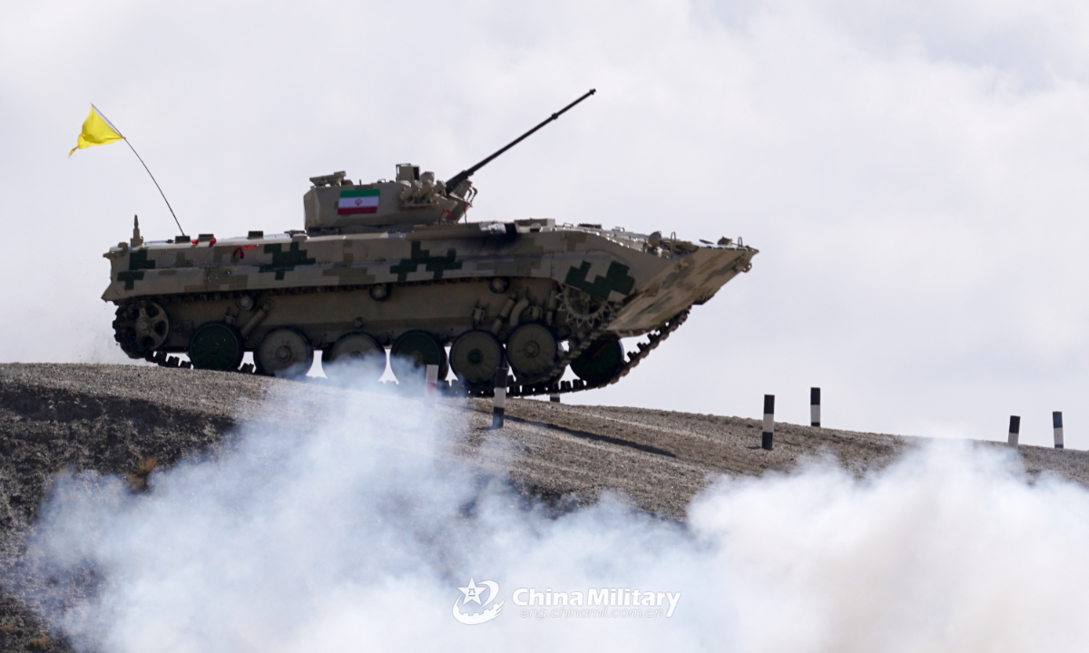 An infantry fighting vehicle of the Iranian team crosses the mound in the final round of individual race of Suvorov Onslaught contest in Korla, China's Xinjiang Uygur Autonomous Region, on August 18, 2022. Photo:China Military