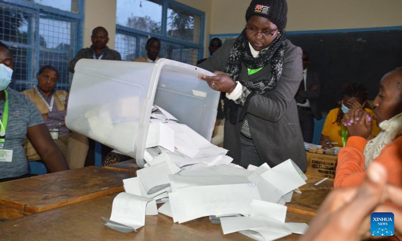 An official of Kenya's Independent Electoral and Boundaries Commission counts ballots at a polling station in Nairobi Aug. 9, 2022. Kenya on Tuesday held general elections for the country's fifth president, members of the National Assembly, senators, and county governors.(Photo: Xinhua)