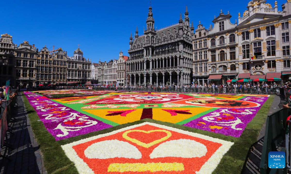 People visit the Flower Carpet 2022 at the Grand Place in Brussels, Belgium, Aug 12, 2022.

After the cancellation of the Flower Carpet 2020 due to the COVID-19 pandemic, the traditional festival returned to Brussels from Aug 12 to 15, 2022. Photo: Xinhua