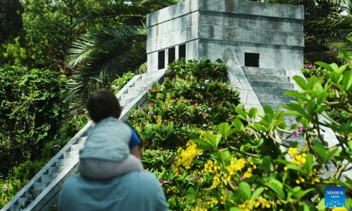 Tourists view the floral and cultural exhibits during the opening day of Hanging Gardens - Mexican Roots floral display, held at Flower Dome of the Singapore's Gardens by the Bay on Aug 19, 2022. Photo:Xinhua