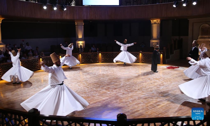 People perform the Sufi whirling dance in Konya, Türkiye, on Aug. 10, 2022.(Photo: Xinhua)