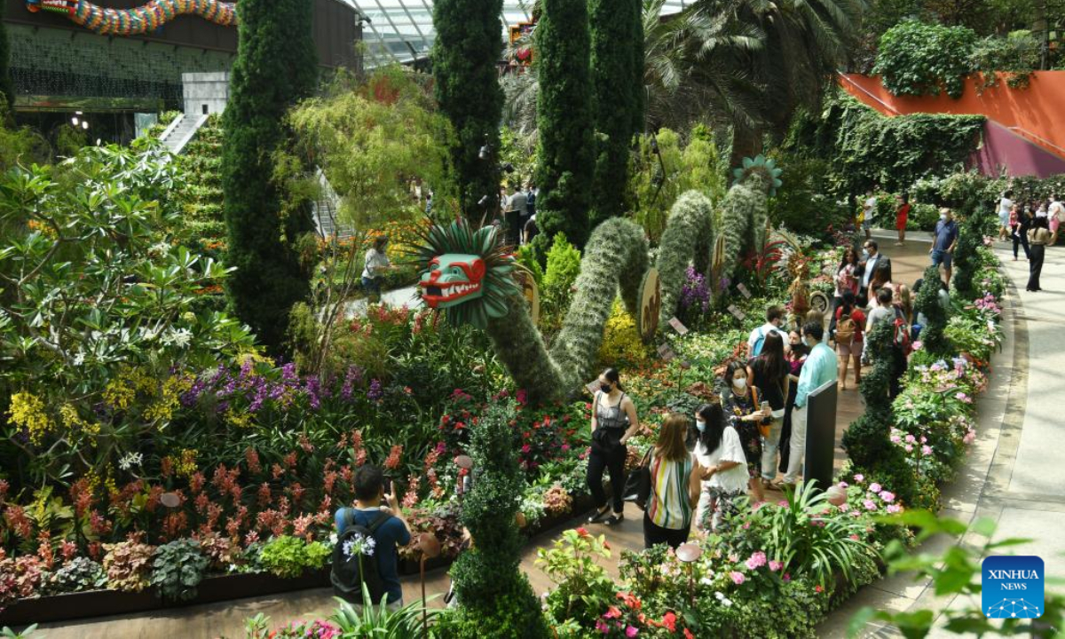 Tourists view the floral and cultural exhibits during the opening day of Hanging Gardens - Mexican Roots floral display, held at Flower Dome of the Singapore's Gardens by the Bay on Aug 19, 2022. Photo:Xinhua