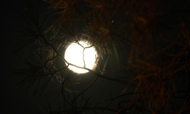 A full moon is seen in the sky over Troodos Mountains in Cyprus, Aug. 12, 2022. Photo: Xinhua