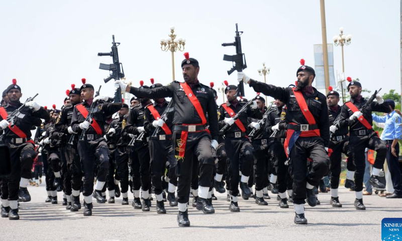 Pakistani police force march during an event to celebrate the country's Independence Day in Islamabad, capital of Pakistan, on Aug. 13, 2022.  Photo: Xinhua