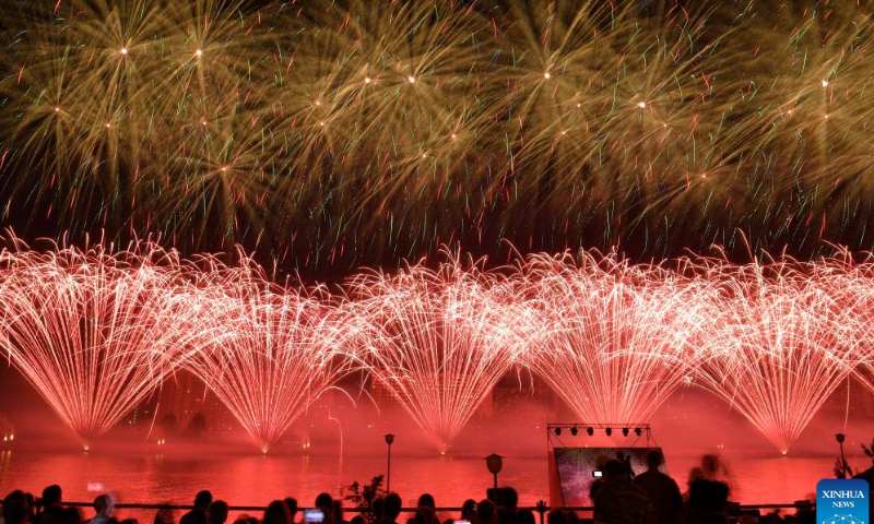 People watch fireworks during the Rostec fireworks festival in Moscow, Russia, on Aug. 14, 2022. Photo: Xinhua