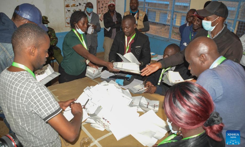 Kenya's Independent Electoral and Boundaries Commission officials count votes by displaying to agents at a polling station in Nairobi Aug. 9, 2022. Kenya on Tuesday held general elections for the country's fifth president, members of the National Assembly, senators, and county governors.(Photo: Xinhua)