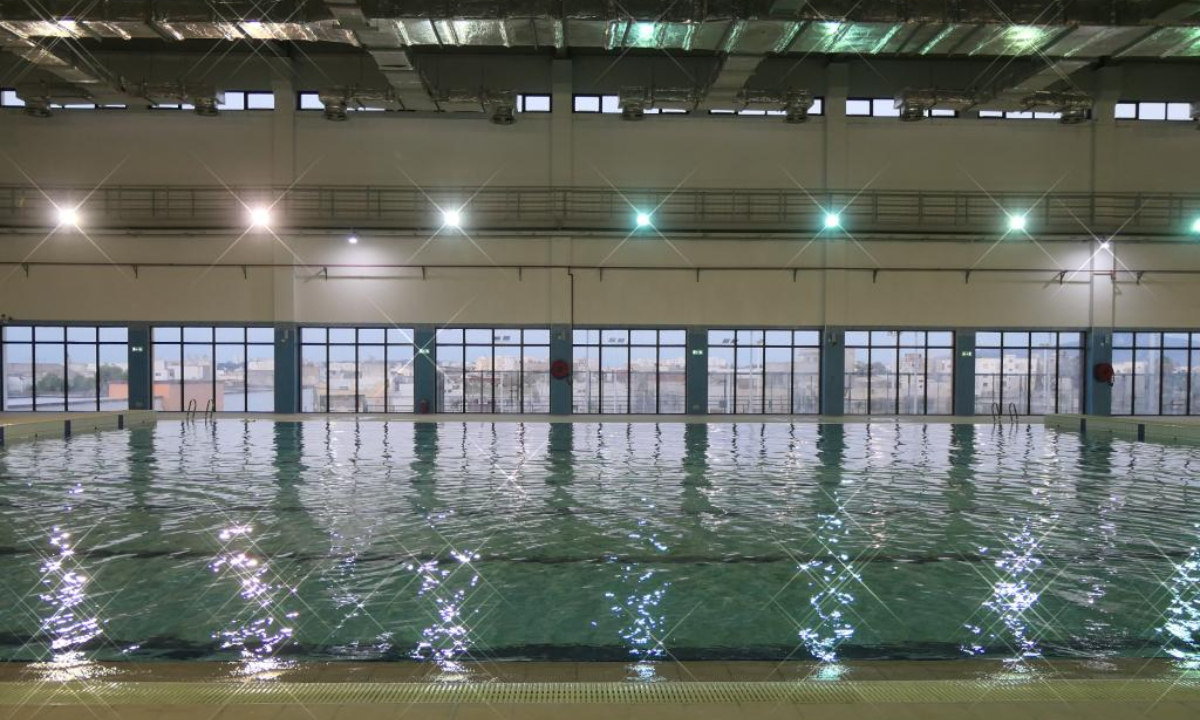Photo taken on Aug 11, 2022 shows an indoor swimming pool of the Ben Arous Sports and Cultural Center for Youth in Ben Arous province, Tunisia. The China-aided Ben Arous Sports and Cultural Center for Youth in northeastern Tunisia will be delivered to Tunisian authorities within a month, Tunisian Sports and Youth Minister Kamel Deguiche has said.Photo:Xinhua