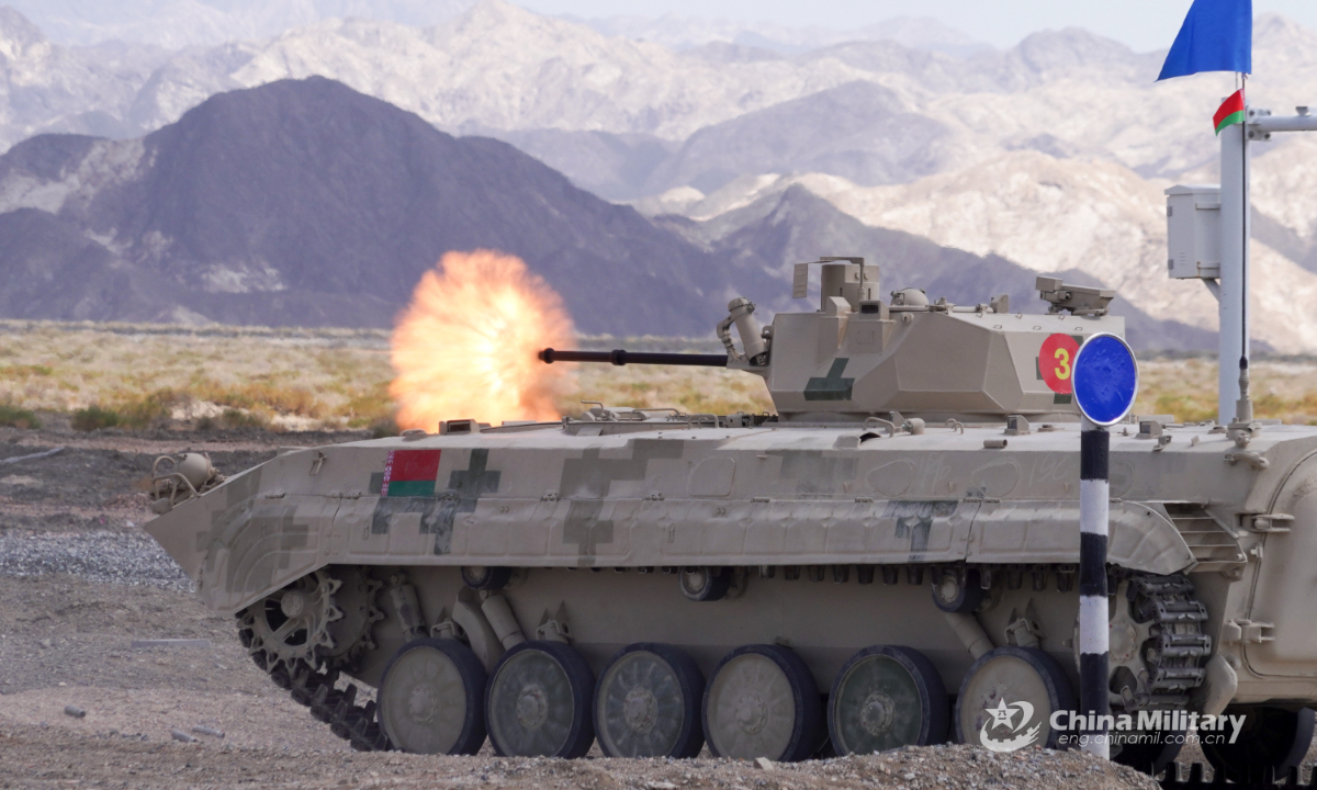 An infantry fighting vehicle of the Belarusian team fires at targets in the final round of individual race of Suvorov Onslaught contest in Korla, China's Xinjiang Uygur Autonomous Region, on August 18, 2022. Photo:China Military