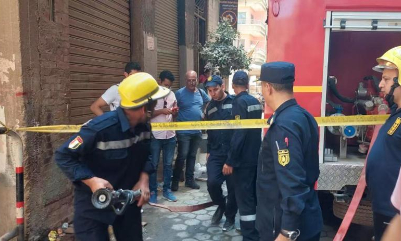 Fire fighters work at a fire site in Giza Province, Egypt, on Aug. 14, 2022. At least 41 people were killed and 12 wounded in a massive fire that broke out in a Coptic church in Egypt's Giza Province on Sunday, the Egyptian Health Ministry said. Photo: Xinhua