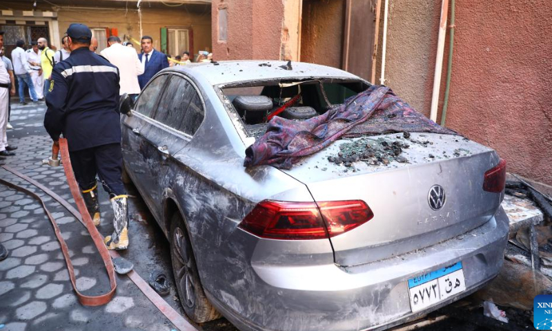 Photo taken on Aug. 14, 2022 shows a damaged car outside the fire site at a Coptic church in Giza Province, Egypt. At least 41 people were killed and 12 injured in a massive fire that broke out in a Coptic church in Egypt's Giza Province on Sunday, the Egyptian Health Ministry said. Photo: Xinhua