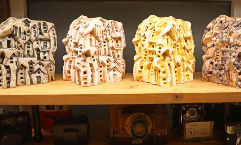 Exhibits are displayed in the exhibition dubbed Up and Coming - Talented Photographers at the Art District House of Photography in eastern Beirut, Lebanon, Aug. 11, 2022. Photo: Xinhua