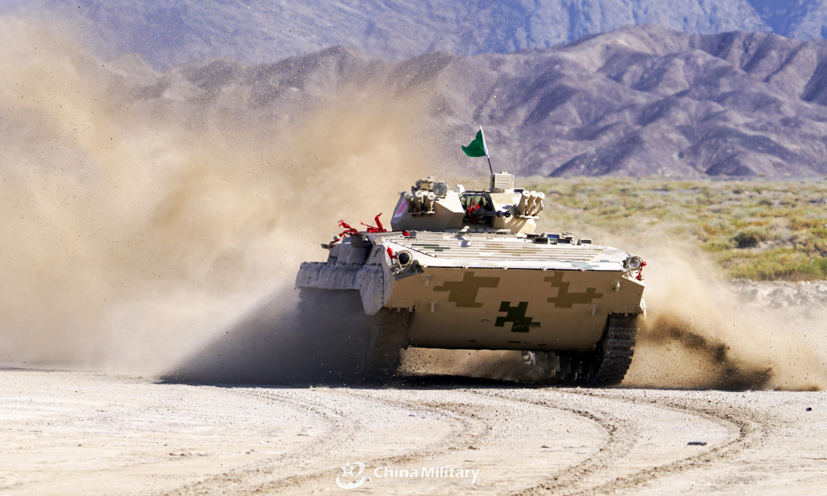 An infantry fighting vehicle of the Chinese team swerves sharply on the track in the final round of individual race of Suvorov Onslaught contest in Korla, China's Xinjiang Uygur Autonomous Region, on August 18, 2022. Photo:China Military