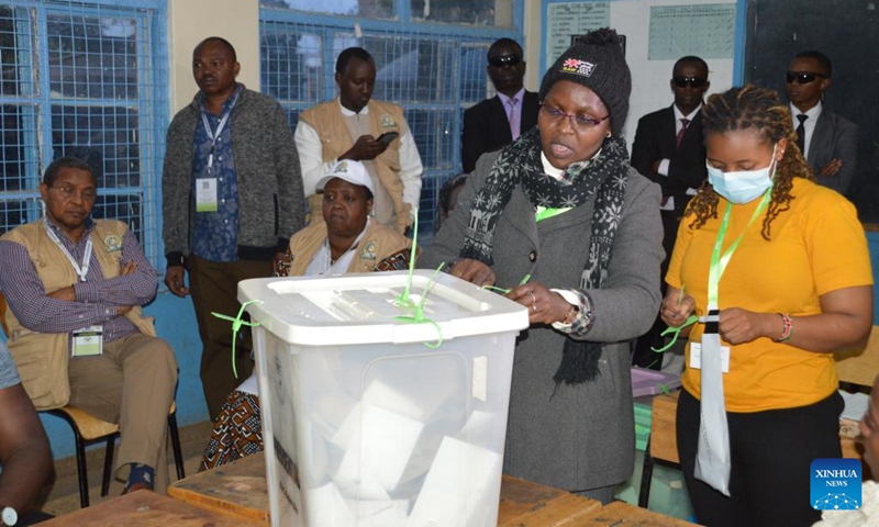 An official of Kenya's Independent Electoral and Boundaries Commission opens a ballot box for counting at a polling station in Nairobi Aug. 9, 2022. Kenya on Tuesday held general elections for the country's fifth president, members of the National Assembly, senators, and county governors.(Photo: Xinhua)