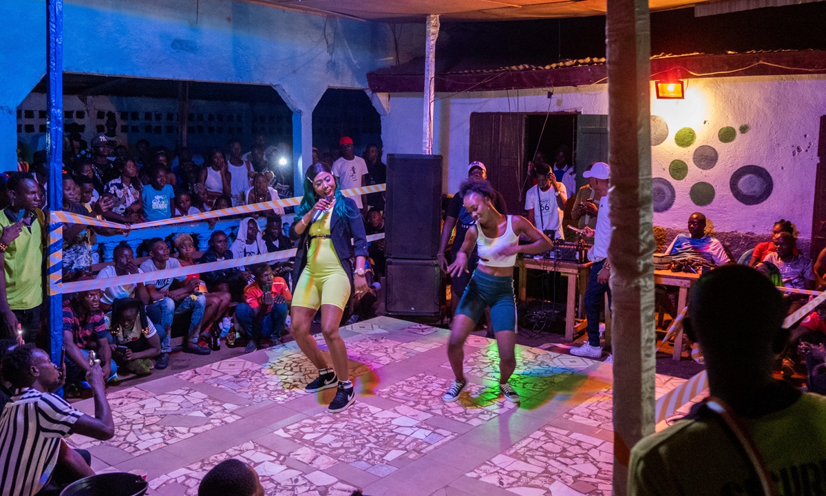 Rapper Cool Fawa (center) performs during a concert to support young artists in Bangui, the Central African Republic, on July 17, 2022. Photos: AFP Rapper Cool Fawa works in her studio in Bangui, the Central African Republic.