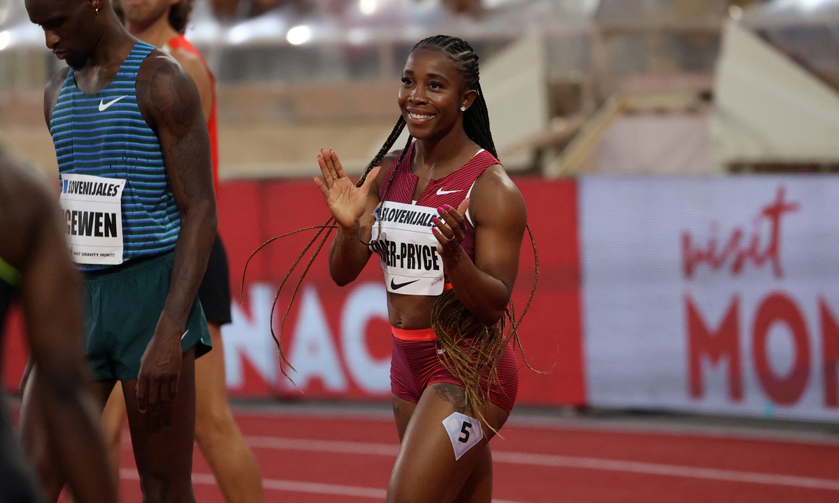 Jamaica's Shelly-Ann Fraser-Pryce celebrates after winning the 100-meter women event at the Wanda Diamond League athletics meeting at the Louis II Stadium in Monaco on August 10, 2022. Photo: AFP