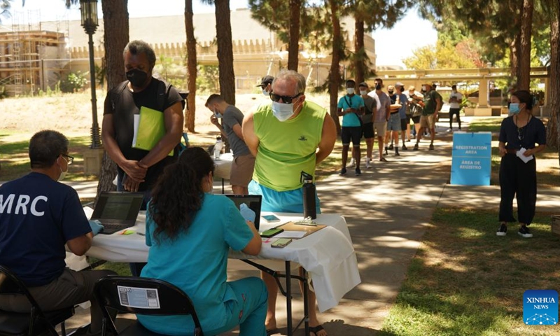 People wait to be vaccinated at a monkeypox vaccination site in Los Angeles, California, the United States, on Aug. 11, 2022. Confirmed monkeypox cases in the United States have exceeded the mark of 10,000, reaching 10,392 cases Wednesday, according to the newest data released by the Centers for Disease Control and Prevention (CDC), the country's national public health agency.(Photo: Xinhua)