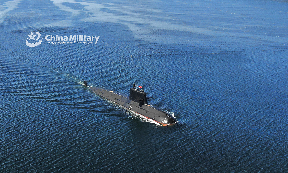 A submarine attached to a submarine flotilla with the navy under the PLA Northern Theater Command sails in a sea area during a maritime training exercise on July 16, 2022. (eng.chinamil.com.cn/Photo by Zhang Nan)