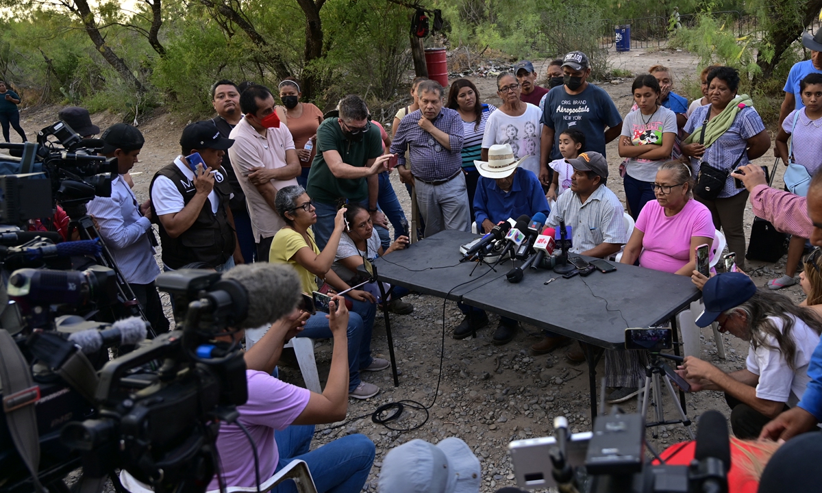 Relatives of the 10 miners trapped in a coal mine after a collapse more than a week ago deliver a press conference in the community of Agujita, Sabinas Municipality, Mexico, on August 14, 2022. The flooded mine where the workers have been trapped for 11 days in northern Mexico registered an 