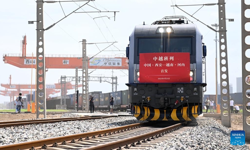 A China-Vietnam freight train pulls out of Xi'an international port in Xi'an, northwest China's Shaanxi Province, Aug. 23, 2022. The freight train left the Xi'an international port in Shaanxi Province on Tuesday for Vietnam's Hanoi, marking the first China-Vietnam freight train route connecting Shaanxi and Vietnam.

The train was loaded with 41 carriages of asbestos which were transported from Kazakhstan to Xi'an via the China-Europe freight train service. (Xinhua/Li Yibo)
