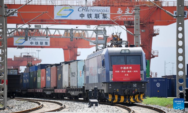 A China-Vietnam freight train pulls out of Xi'an international port in Xi'an, northwest China's Shaanxi Province, Aug. 23, 2022. The freight train left the Xi'an international port in Shaanxi Province on Tuesday for Vietnam's Hanoi, marking the first China-Vietnam freight train route connecting Shaanxi and Vietnam.

The train was loaded with 41 carriages of asbestos which were transported from Kazakhstan to Xi'an via the China-Europe freight train service. (Xinhua/Li Yibo)

