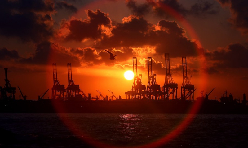 Photo taken on Aug. 13, 2022 shows the sunset view of Alexandria port in Alexandria, Egypt.(Photo: Xinhua)