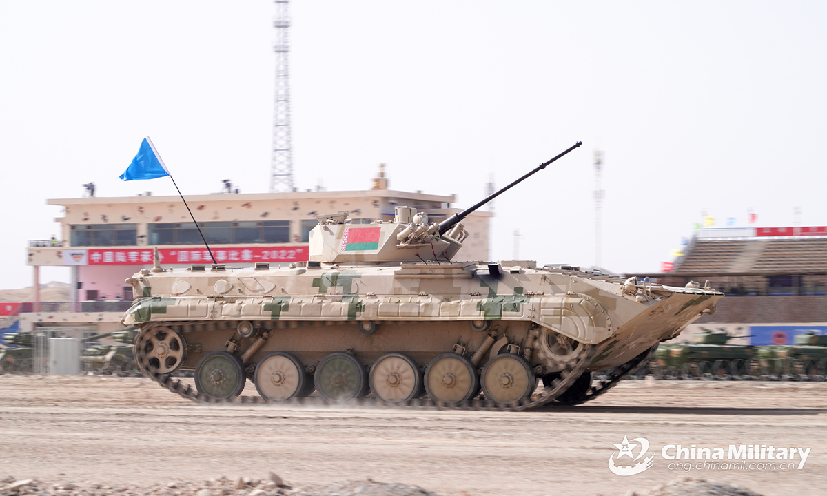 An infantry fighting vehicle of the Belarus team passes the viewing stand in the first round of individual race of the Suvorov Onslaught contest in Korla, China's Xinjiang Uygur Autonomous Region, on August 14, 2022. The Suvorov Onslaught of the International Army Games 2022 (IAG 2022) kicked off on August 14 with participation of six teams from five countries, namely China, Russia, Belarus, Iran and Venezuela. (Photo by Zhang Guangdong)
