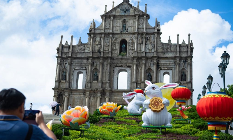 Festive installations in celebration of the upcoming Mid-Autumn Festival are seen in front of the Ruins of the St. Paul's in Macao, south China, Aug. 21, 2022. (Xinhua/Cheong Kam Ka)