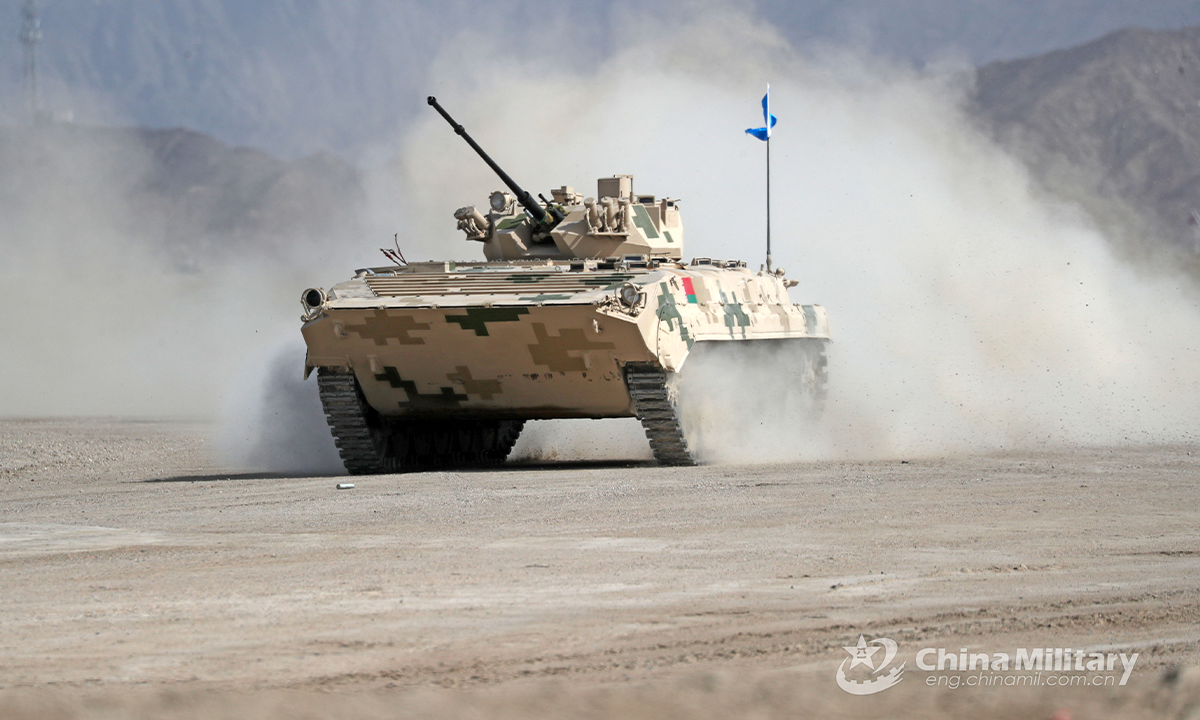 An infantry fighting vehicle of the Belarus team gallops on the track at full speed in the first round of individual race of the Suvorov Onslaught contest in Korla, China's Xinjiang Uygur Autonomous Region, on August 14, 2022. The Suvorov Onslaught of the International Army Games 2022 (IAG 2022) kicked off on August 14 with participation of six teams from five countries, namely China, Russia, Belarus, Iran and Venezuela. (Photo by Luo Xingcang)