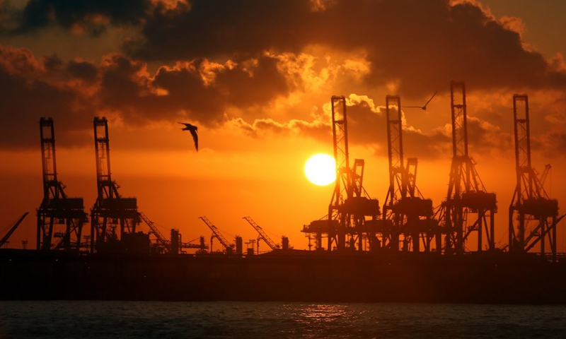 Photo taken on Aug. 13, 2022 shows the sunset view of Alexandria port in Alexandria, Egypt.(Photo: Xinhua)