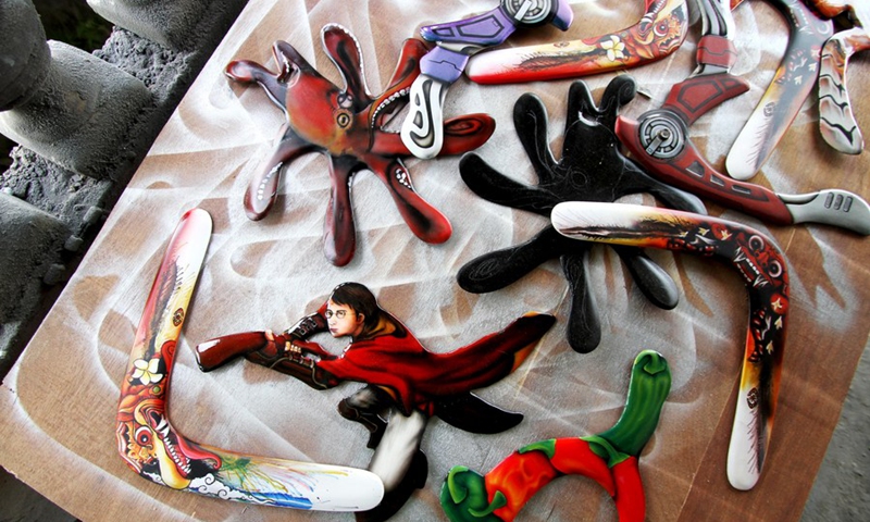 Photo taken on Aug. 22, 2022 shows airbrush boomerang crafts displayed at a workshop in Bendungan village, Sragen district, Central Java, Indonesia.(Photo: Xinhua)