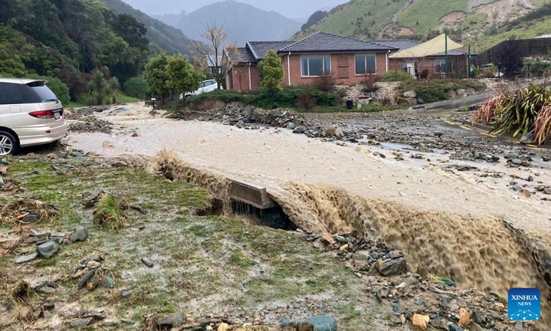 Floodwater cuts off a road in Nelson of South Island, New Zealand, Aug. 18, 2022. The West Coast and Nelson-Tasman regions of New Zealand's South Island have been hit hard by heavy rain and flooding.(Photo: Xinhua)