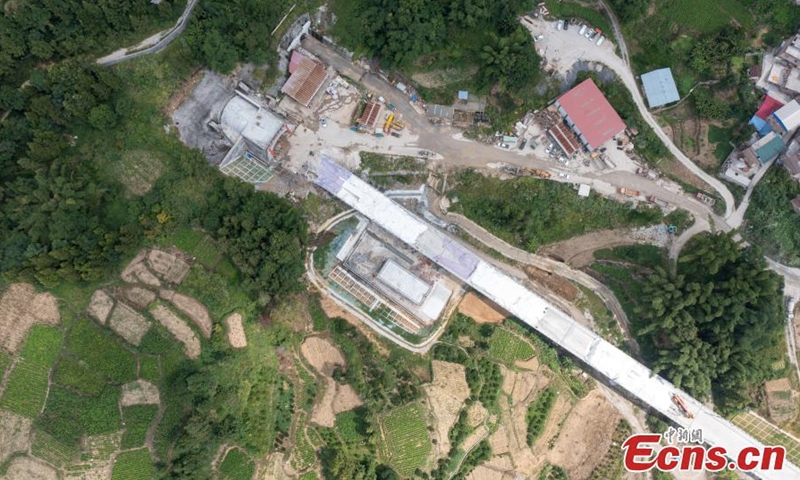The Jiuwandashan No. 4 tunnel on Guiyang-Nanning high speed railway is drilled though in Hechi City, south China's Guangxi Zhuang Autonomous Region, Aug. 17, 2022. (Photo: China News Service/Wang Yizhao)