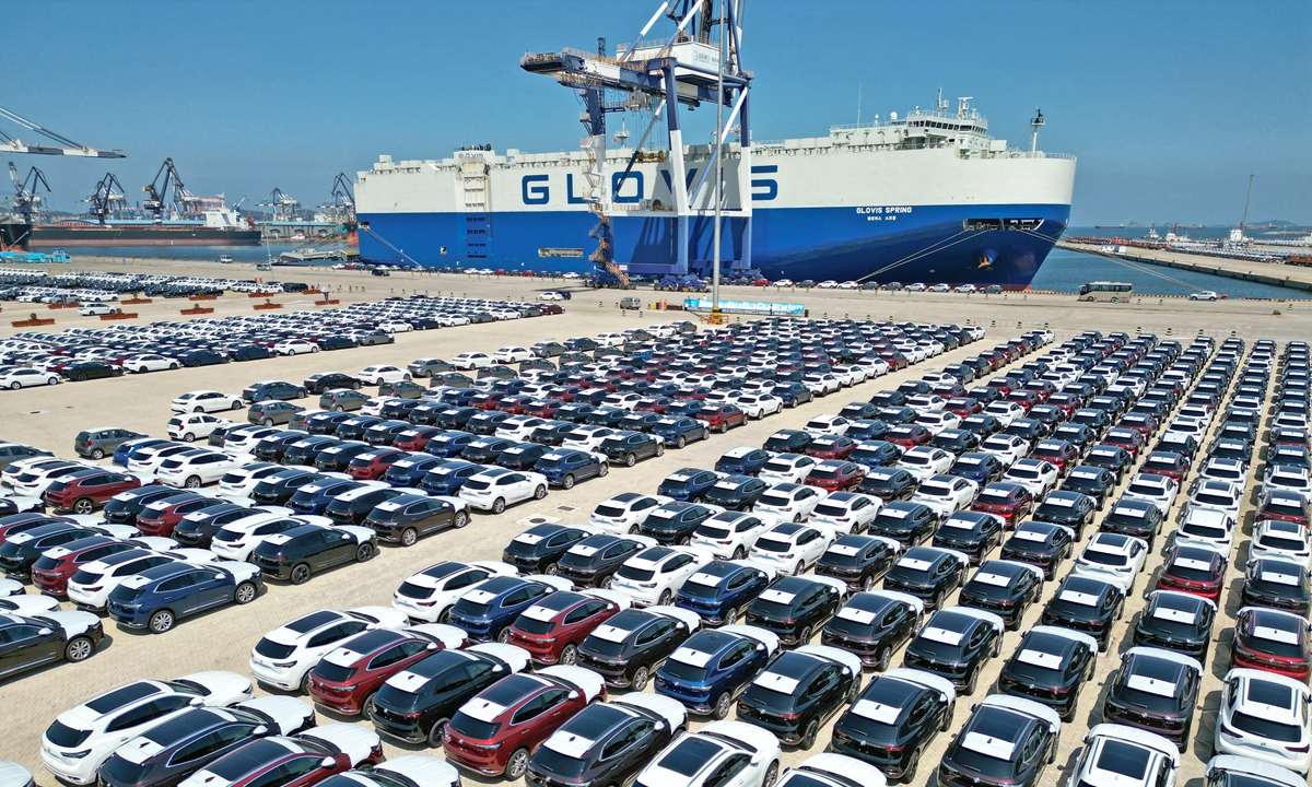 A large number of vehicles are arranged at a port in Yantai, East China's Shandong Province, waiting to be loaded and shipped to overseas markets, on August 17, 2022. Photo: VCG