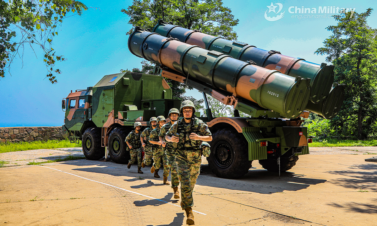 Soldier assigned to a naval coast-defense missile regiment under the PLA Northern Theater Command rush to their positions during a recent combat training exercise. The exercise was aimed at testing the troops' capability of winning under real combat conditions. (eng.chinamil.com.cn/Photo by Peng Xi, Liu Zihao, Teng Hao and Han Shuai)