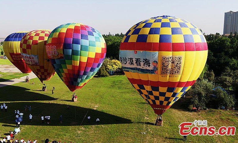 Hot air balloons are displayed at the 2022 Wuhai Aviation Carnival in north China's Inner Mongolia Autonomous Region, Aug. 17, 2022. (Photo/China News Service)