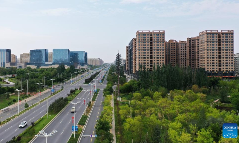 Aerial photo taken on Aug. 10, 2022 shows the cityscape of Lanzhou New Area in Lanzhou, northwest China's Gansu Province. In 2012, Lanzhou New Area was approved by the State Council as the fifth national level special economic development zone, which is also the first state-level new development area in the northwest of China.(Photo: Xinhua)