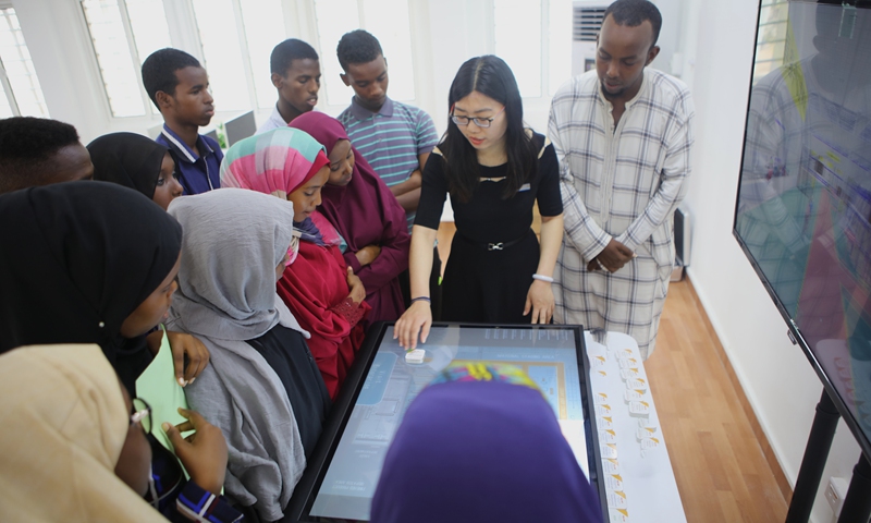 A Chinese teacher guides local students at the Luban Workshop in Djibouti in March 2019. Photo: Courtesy of Tianjin First Commercial School