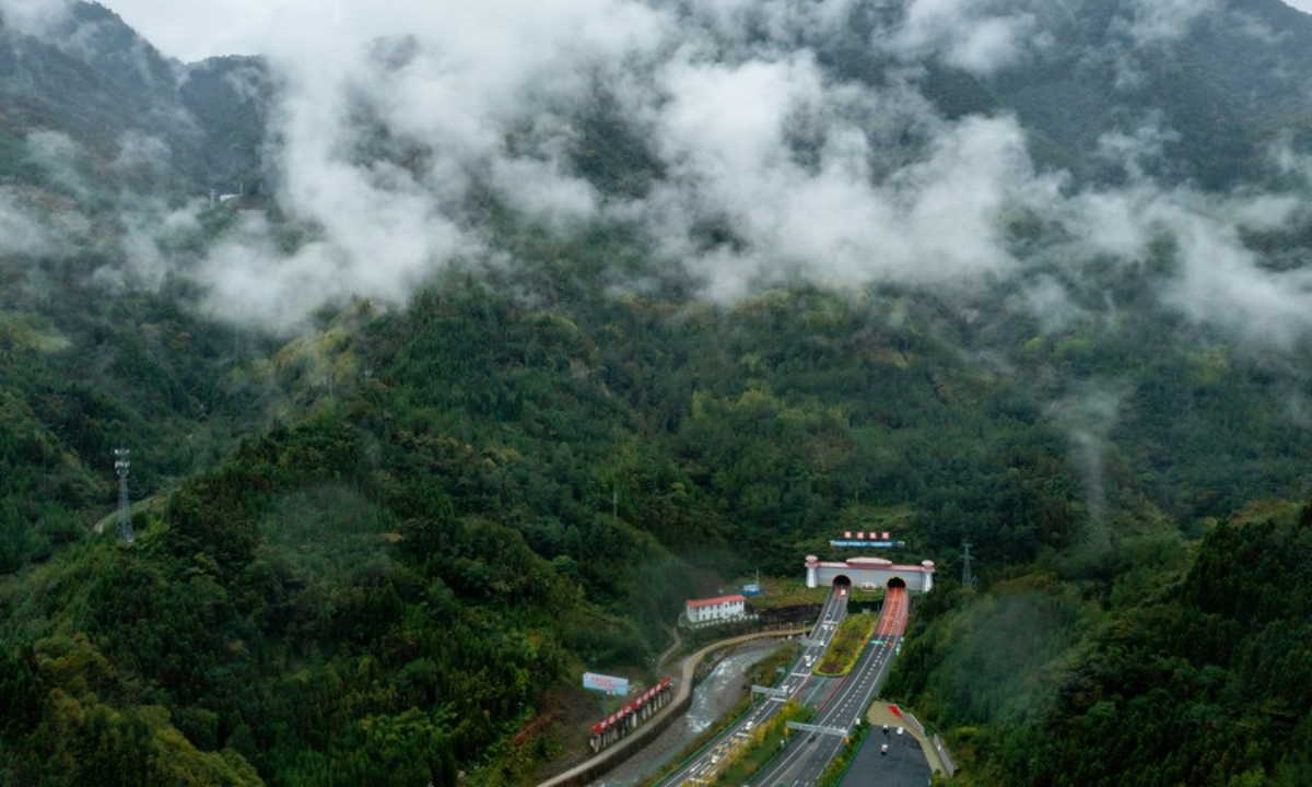 Aerial photo taken on Oct. 21, 2021 shows an entrance of the 13.5-km-long tunnel at Erlang Mountain, a super project on the Ya'an-Kangding expressway, in southwest China's Sichuan Province. Photo:Xinhua