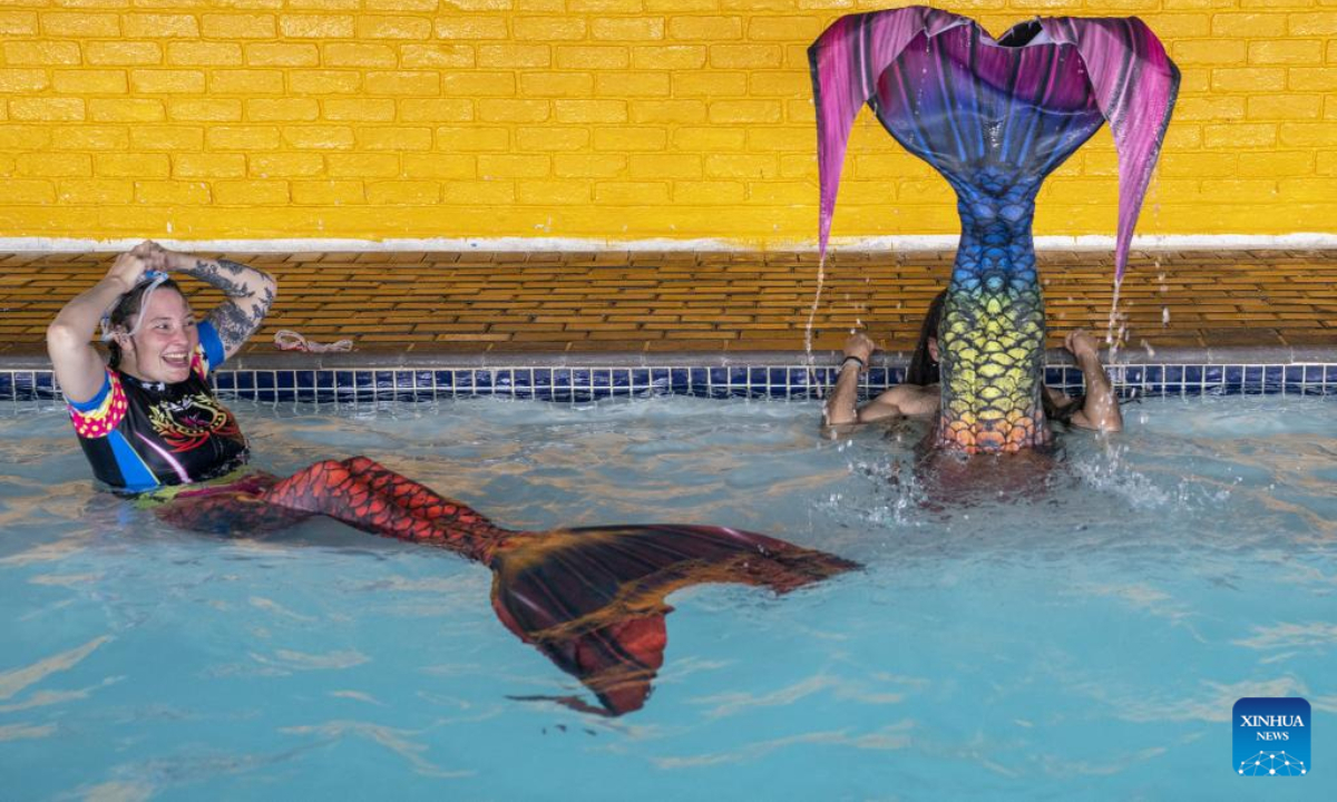 Trainees practise mermaid swimming at the Merschool in Johannesburg, South Africa, Aug 26, 2022. Photo:Xinhua